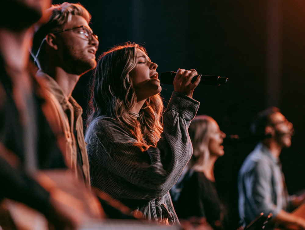 Worship team leading worship